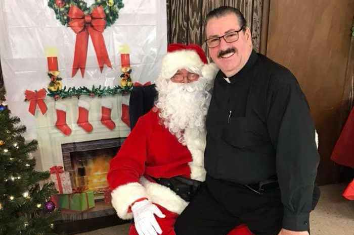 Pastor Andy on Santa's lap